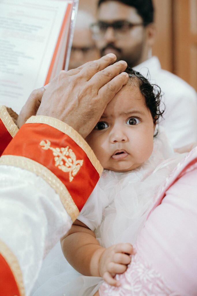 Best newborn photographer in Kerala , baptism photographer in kerala